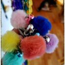 Bleistift mit abnehmbaren Puschelanhänger. In schönen Pastelltönen.