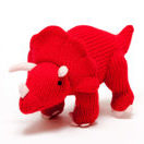 Dinosaurier Triceratops aus rotem Strick. Mittlere Grösse.